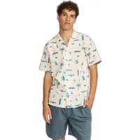 Beige short sleeve Cuban shirt with blue palm tree and car print, button-up front, worn by a model.