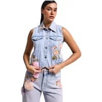 Sleeveless denim jacket with floral embroidery, button-up front, and chest pockets, worn by a woman.