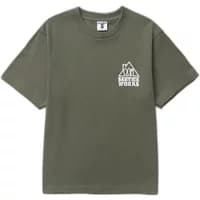 Olive green T-shirt by Service Works, featuring a small white house logo and text on the left chest.