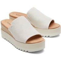 Natural TOMS Women's Diana Mule Wedge with open toe, woven upper, and chunky platform sole.