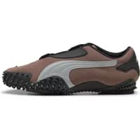 Brown Puma Mostro OG trainers with silver stripe, black textured sole, and Velcro strap closure.