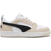 Puma Rebound v6 Low SD trainers, beige and white with black stripe, lace-up design, and cushioned sole.