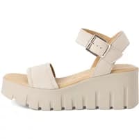 Beige Tamaris wedge sandals with platform sole, adjustable ankle strap, and open toe design.