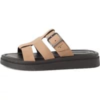 Beige wedge mules with wide straps, buckle detail, and black platform sole by Tamaris.