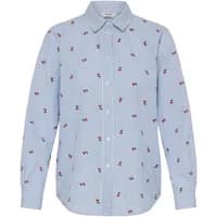 Light blue woman's shirt with red and black embroidered patterns, button-down front, and pointed collar.