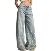 Women’s mid-rise palazzo jeans with wide legs and elegant floral embroidery on light blue denim.