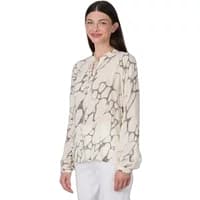 Cream Ragwear Ariela Print blouse with abstract black patterns and long sleeves.