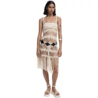 Women's crochet pareo by Desigual, cream color with intricate patterns, fringe hem, and black floral accents.