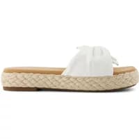 White TOMS Abby women's espadrilles with woven jute sole and knotted fabric upper.