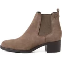 Brown heeled Chelsea boots with elastic side panels and pull tab, featuring a smooth finish and block heel.