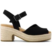 Black TOMS Ispeto heeled sandals with ankle strap, buckle closure, and woven espadrille platform heel.