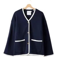 Navy women's jacket with white trim, button front, and two front pockets, by Holebrook Lee.