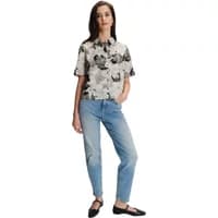 Women's long sleeve shirt with black floral pattern, button-up front, and collar, by Greenpoint.
