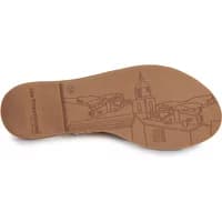 Brown sole of Les Tropeziennes sandal with engraved cityscape design and brand name near the heel.