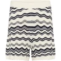 Women's shorts KAFFE KAanna with wavy black and white pattern, elastic waistband, and knee-length fit.