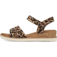 Leopard print women's wedge sandals with cork sole and adjustable ankle strap.