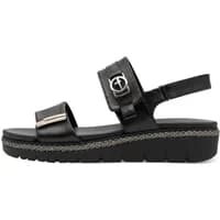 Black Tamaris wedge sandals with buckle straps, textured sole, and decorative stitching.