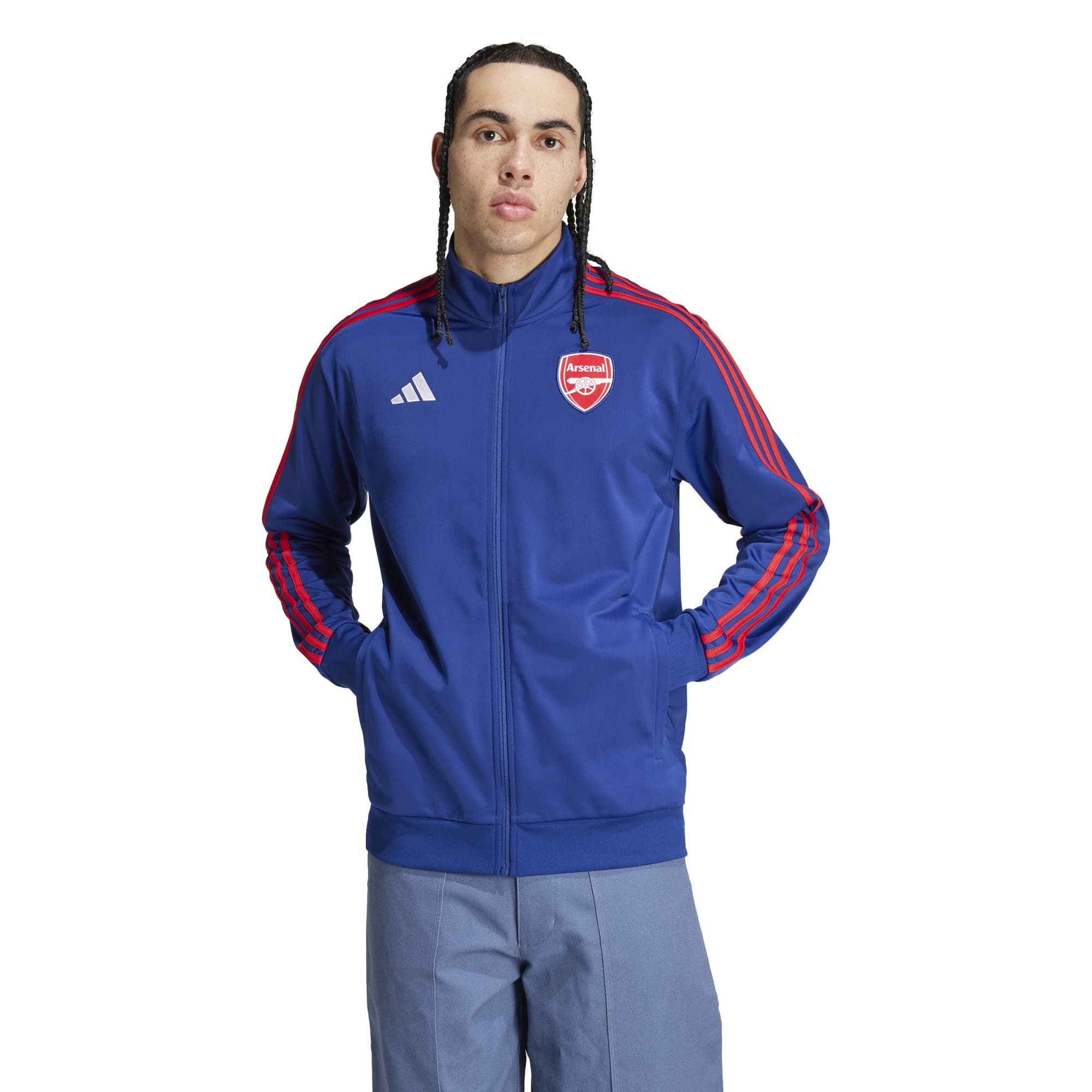 Zipped tracksuit jacket in vibrant blue with red accents, featuring the Arsenal logo on the chest and three red stripes down the sleeves, made from a smooth, lightweight material.