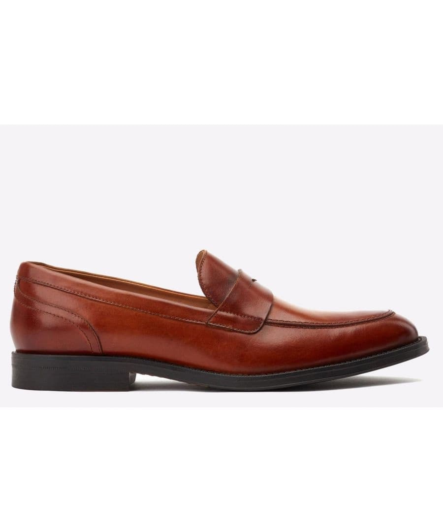 Tan leather slip-on loafer featuring a sleek design, rounded toe, and subtle stitching details, set on a black rubber sole, available in size 7.