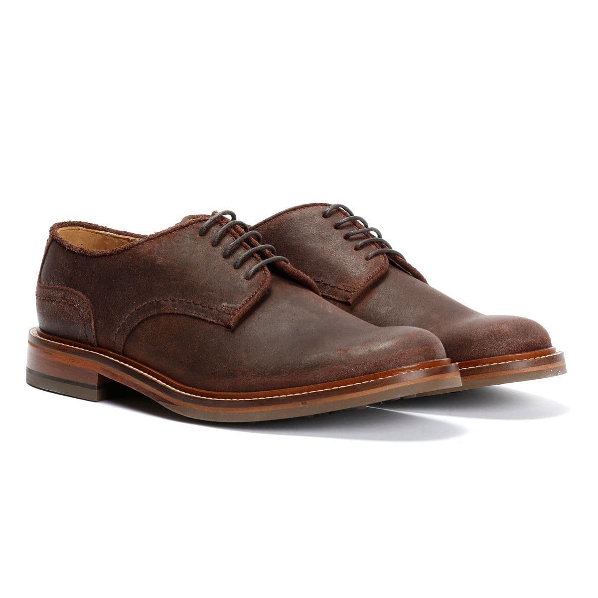 Brown leather Derby shoes with a smooth finish, featuring a rounded toe, five eyelet lace-up design, and a sturdy wooden heel.