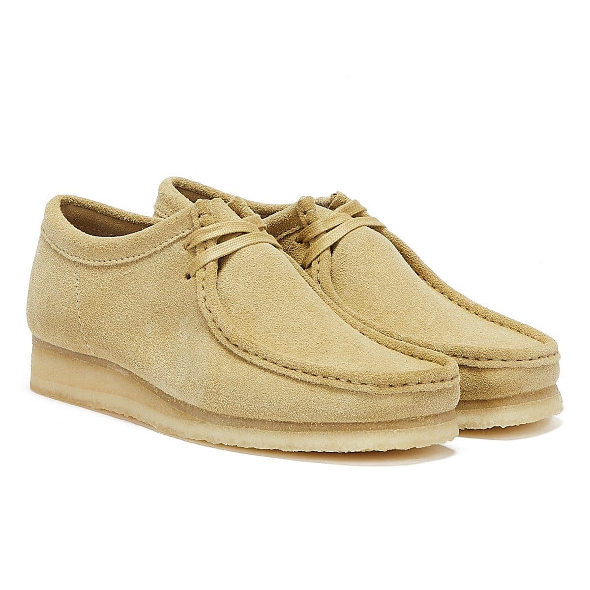 Clarks Originals Men's Wallabees in maple suede, featuring a soft beige color, lace-up design, and a distinctive crepe sole for comfort and style.