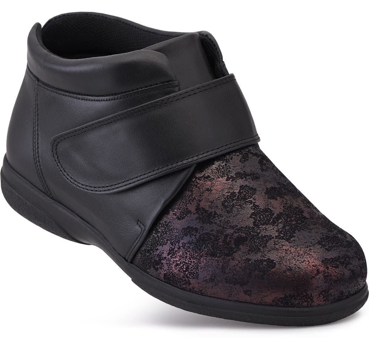 Black leather ankle boots with a velcro strap, featuring a textured dark floral pattern on the front, designed for extra wide fit and comfort for swollen feet.