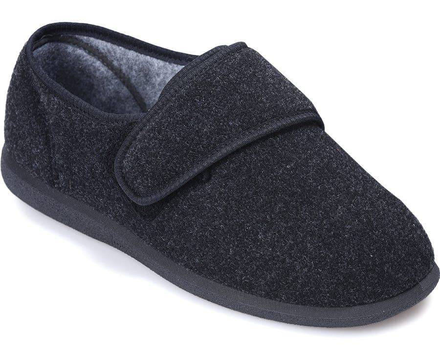 Black extra wide slippers made of soft felt material, featuring a velcro strap for easy adjustment, designed for comfort and support for swollen feet.
