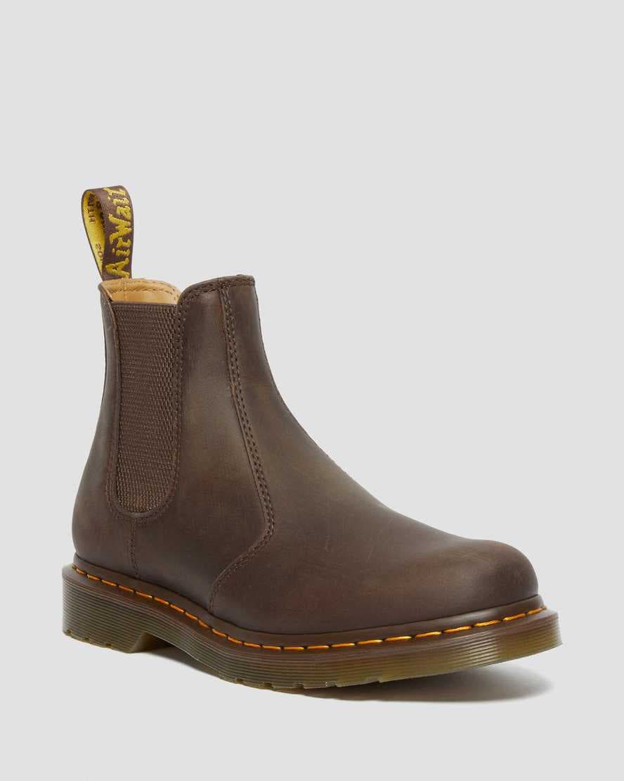 Dark brown smooth leather Chelsea boots with yellow stitching, elastic side panels, and a signature pull tab, featuring a chunky sole and a UK size 3 (US Men's 4 - Women's 5).