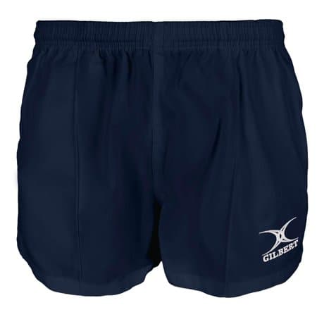 Navy blue rugby shorts made from lightweight material, featuring an elastic waistband and the Gilbert logo printed in white on the lower right side.