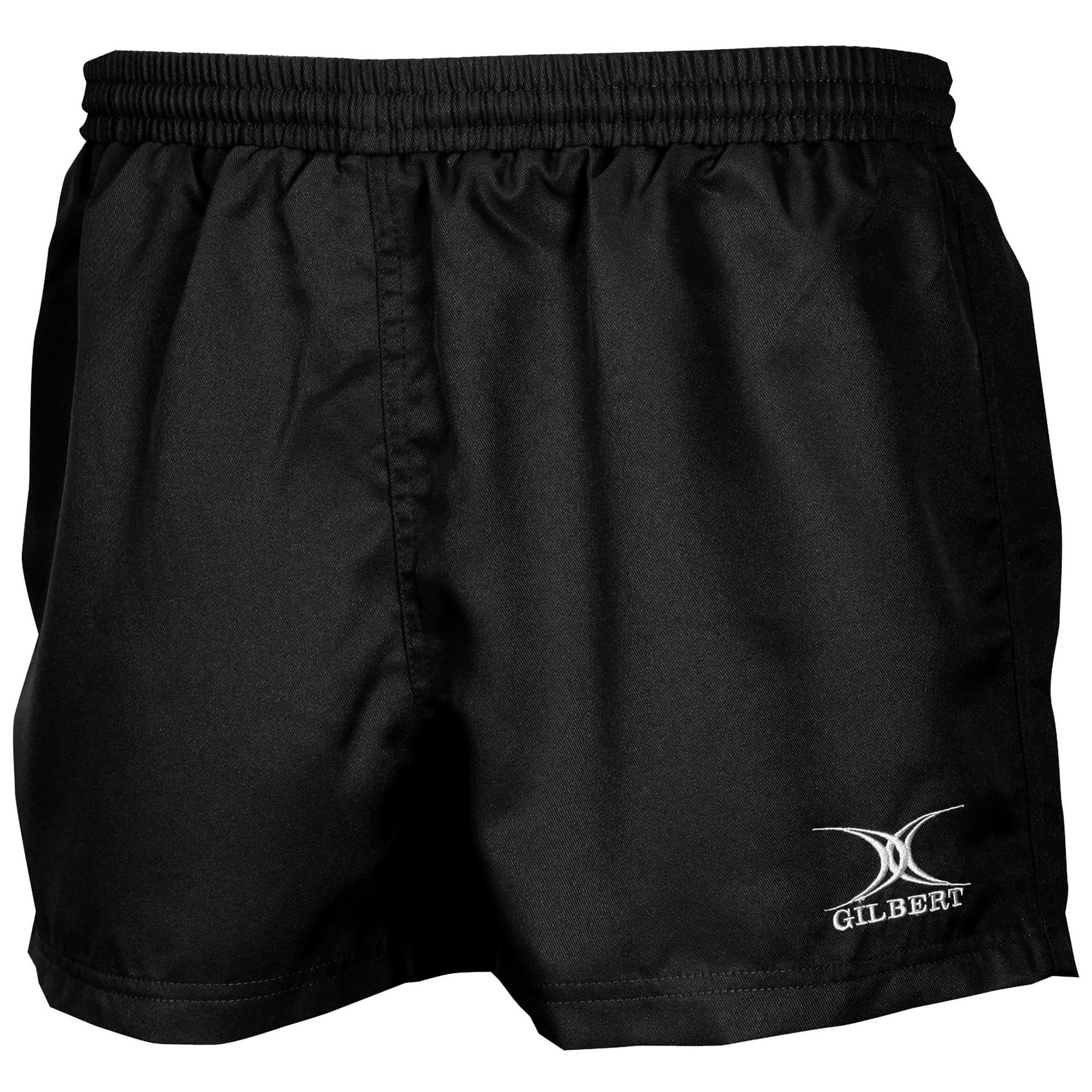 Black rugby match shorts made from lightweight material, featuring an elastic waistband and the Gilbert logo embroidered in white on the left leg.