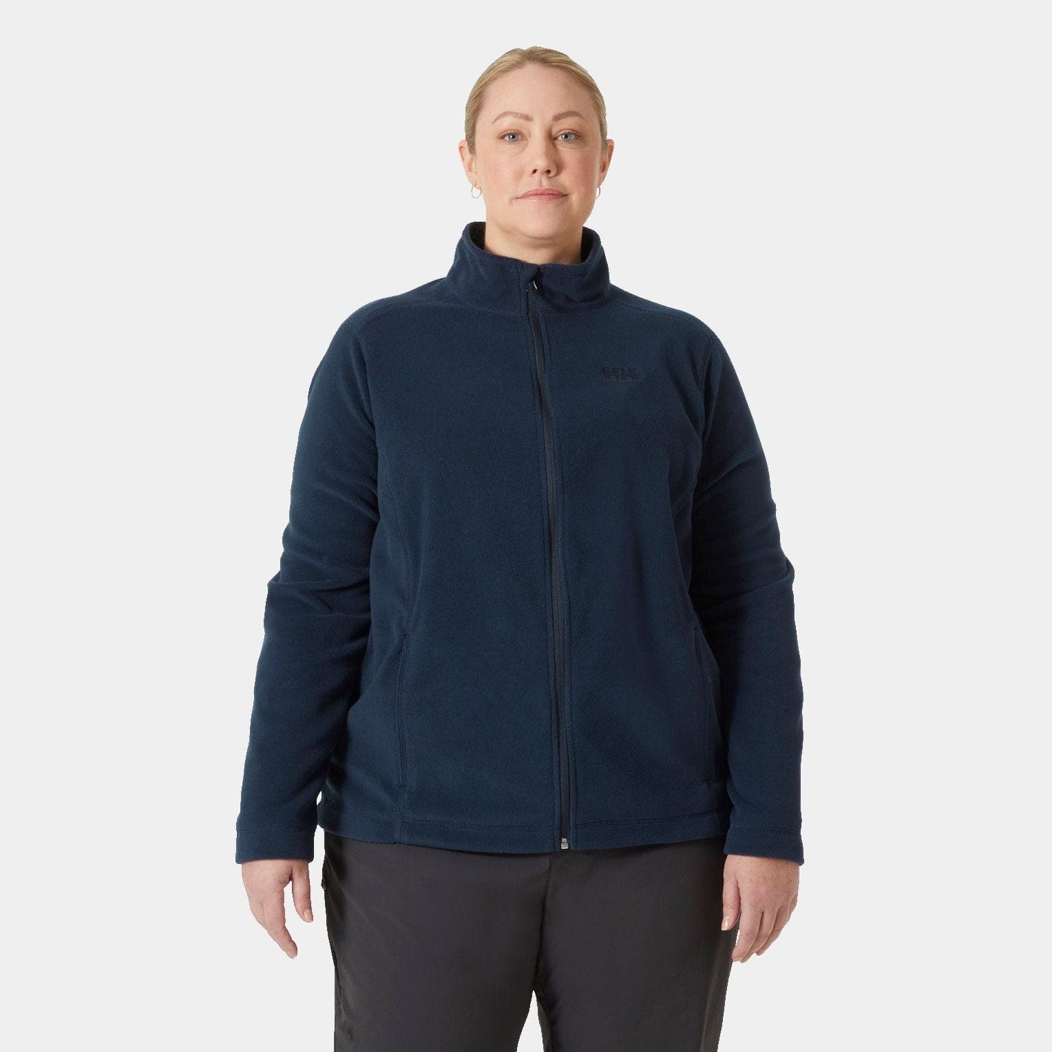 Navy blue fleece sweatshirt featuring a full zip, high collar, and Helly Hansen logo on the chest, designed for women's comfort and warmth.