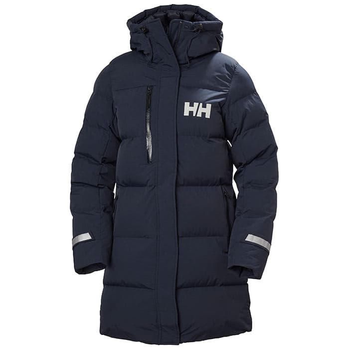 Navy long jacket by Helly Hansen, featuring a puffy design, zippered front, hood, and reflective details, with the brand logo prominently displayed on the chest.