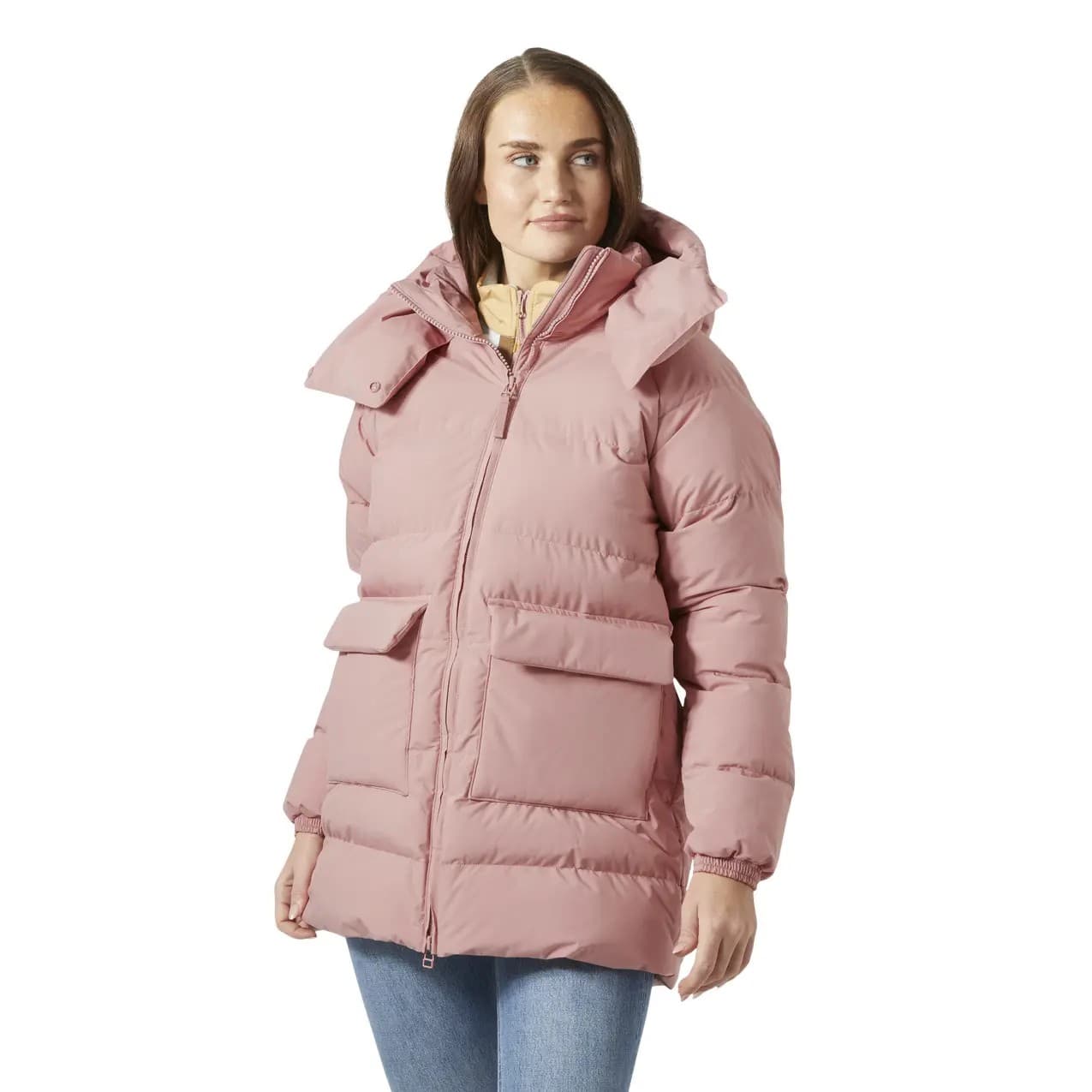 Light pink women's hooded parka by Helly Hansen, featuring a puffy design, front pockets, and a high collar, perfect for warmth and style in cold weather.