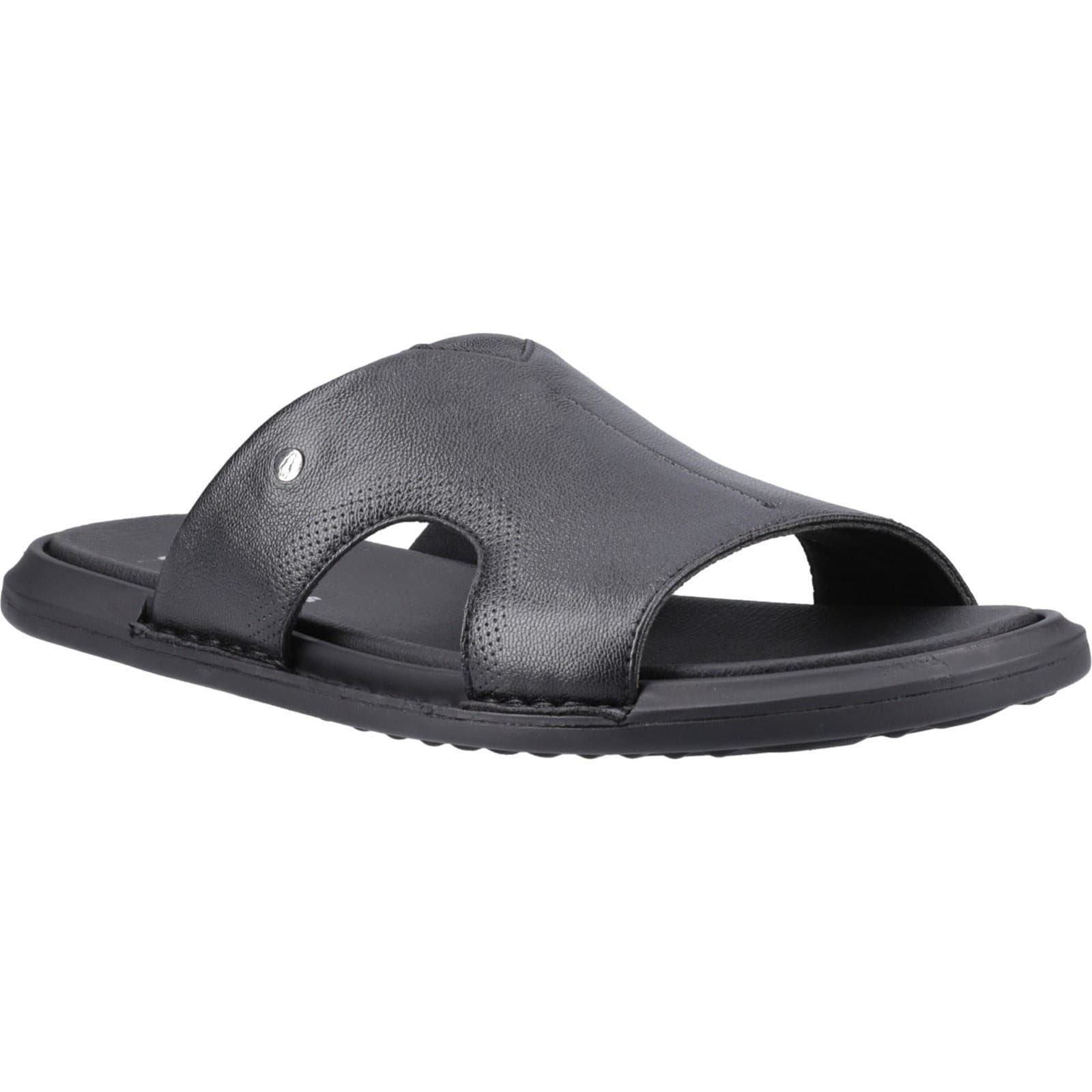 Black leather slide sandal with an open toe and two wide straps, featuring a textured finish and a cushioned sole, available in size 6 by Hush Puppies.