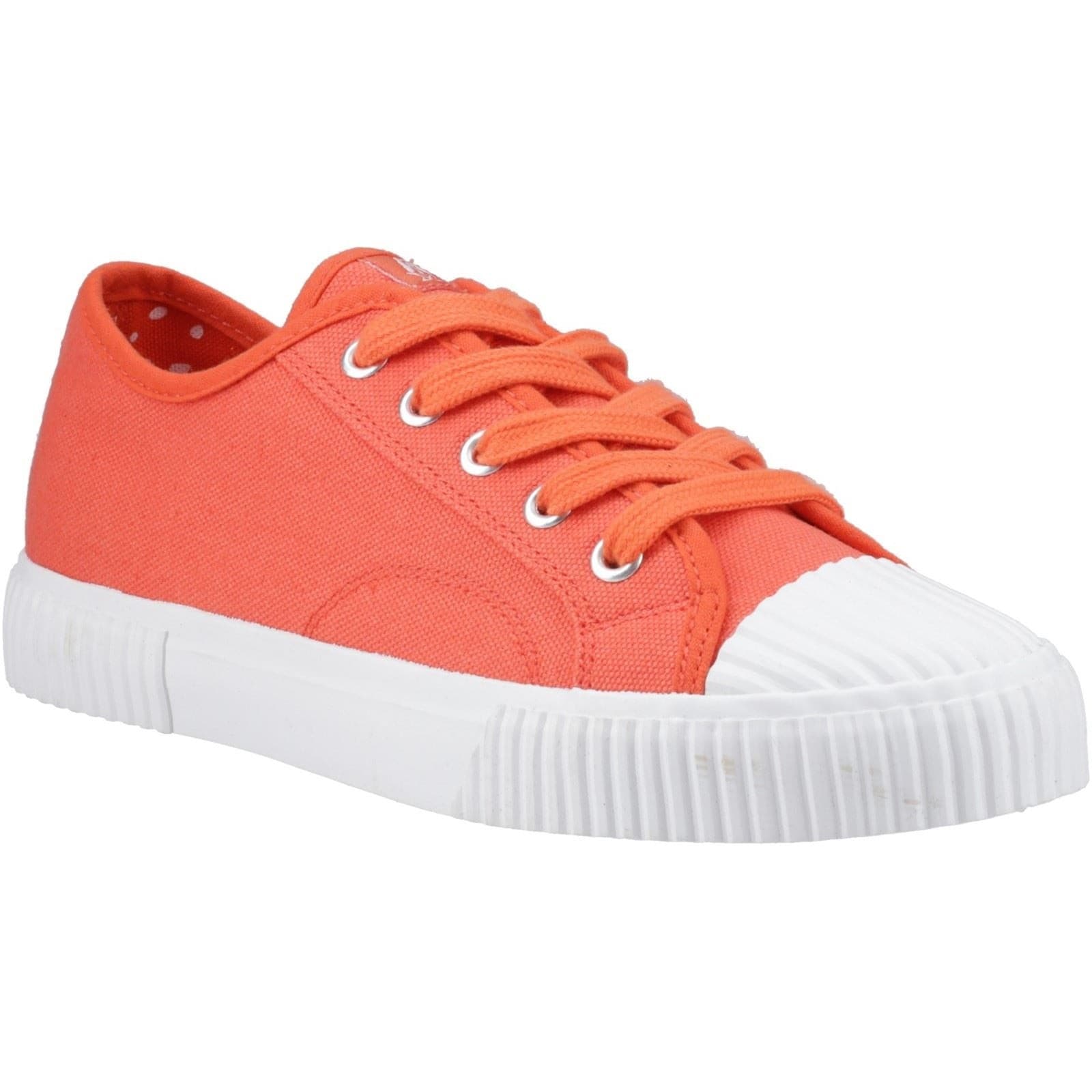 Orange canvas trainer featuring a white rubber toe cap and sole, with matching laces and a polka dot interior lining.