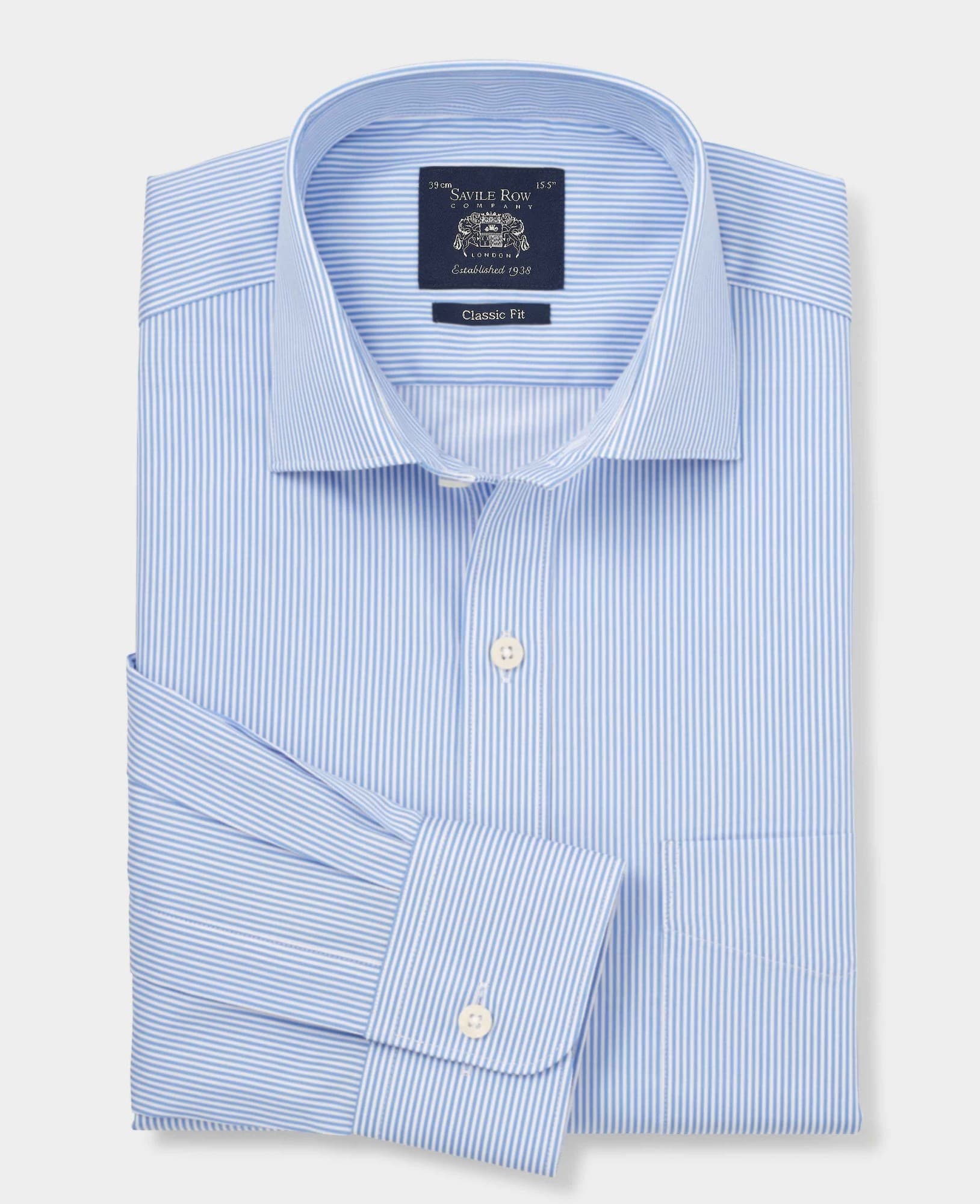 Men's blue cotton twill formal shirt featuring classic fit, single cuff, and light blue stripes, labeled size 17.5 X Extra Long, with a Savile Row Company tag.