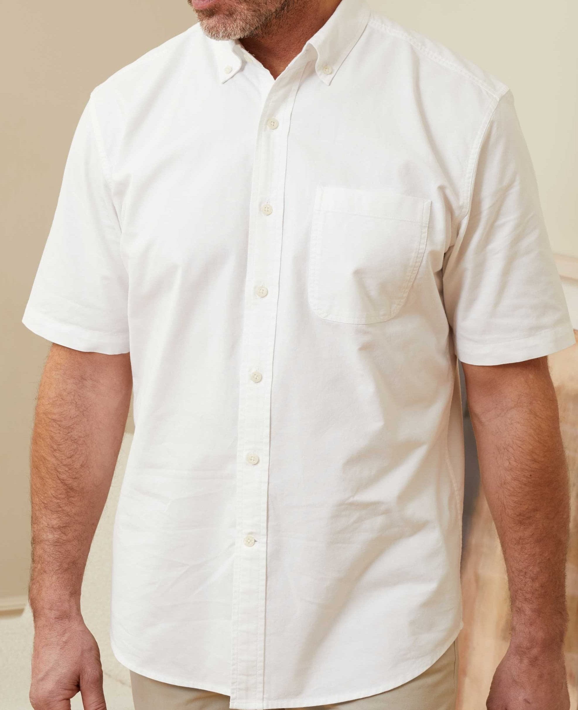 Men's short sleeve Oxford shirt in classic white, featuring a button-down collar, front pocket, and made from breathable cotton, available in size XXL by Savile Row Company.