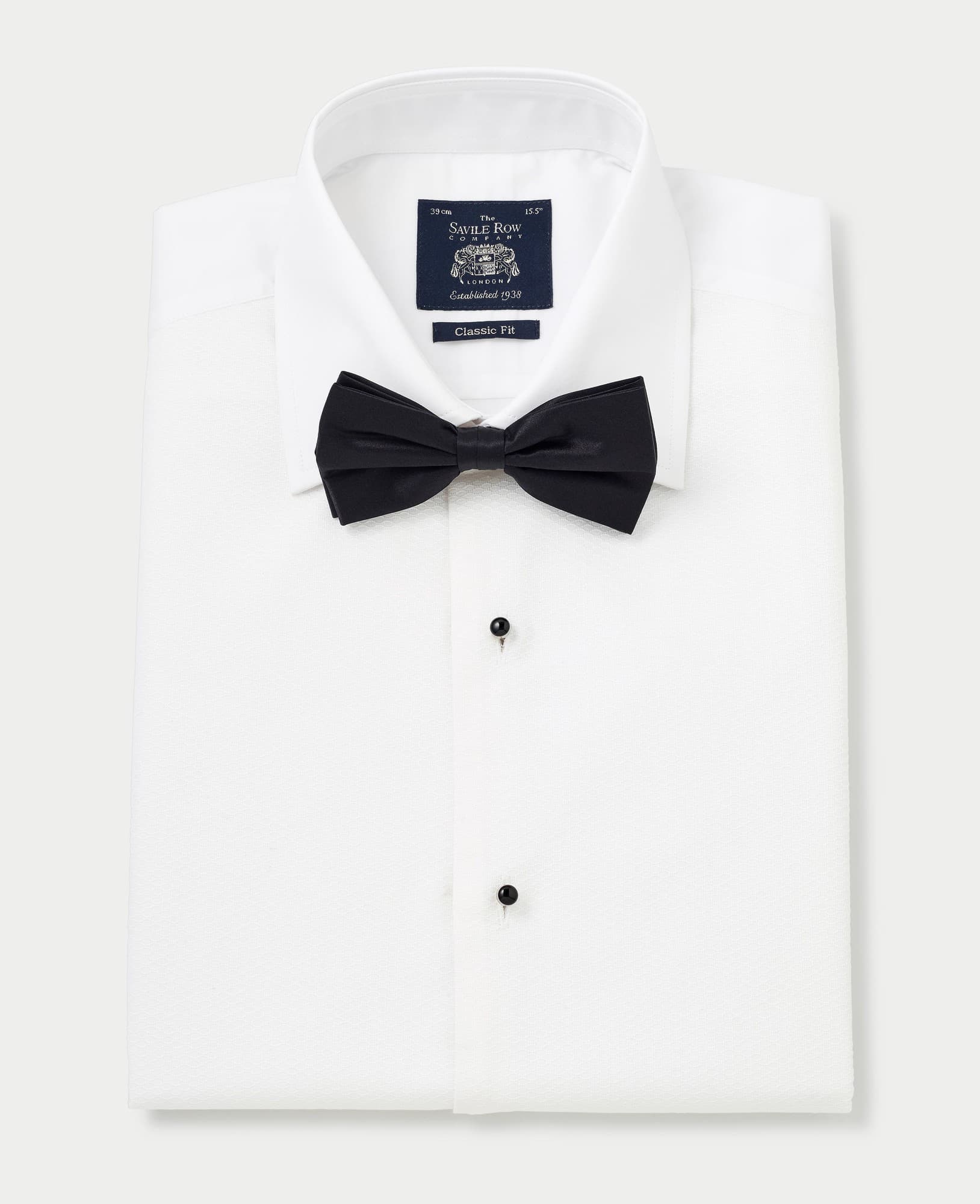 White Marcella bib front dress shirt with double cuffs, featuring a classic fit, size 15 extra long (36"), complemented by a black bow tie and Savile Row Company label.
