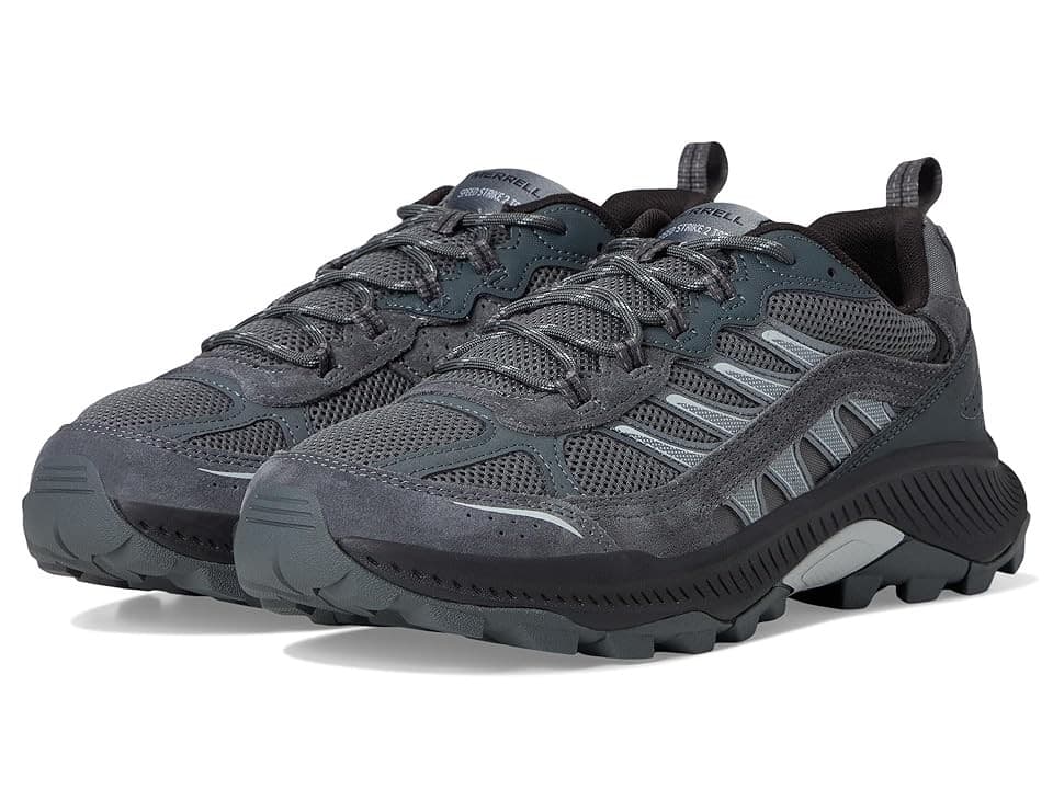 Gray mesh and suede climbing shoes with a rugged sole, featuring reflective accents and a lace-up design, ideal for trekking and outdoor activities.