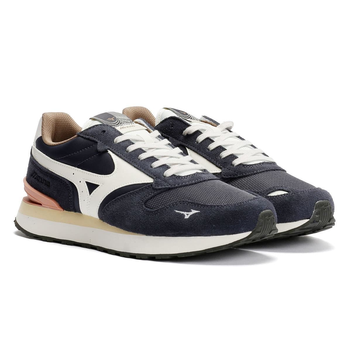 Mizuno RB87 Odyssey trainers feature a grey and pristine upper with cameo brown accents, a textured suede finish, and a cushioned sole for comfort.