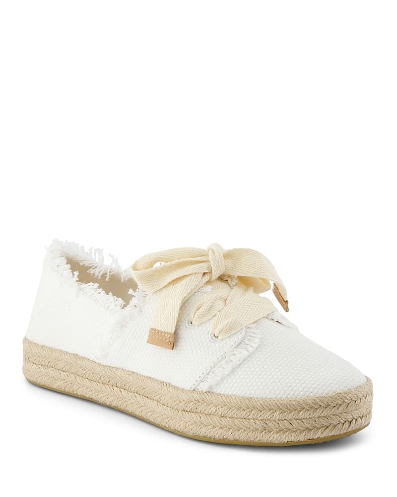 White canvas espadrille flats with a frayed edge and a beige rope sole, featuring a matching bow tie on the front for a casual, stylish look.