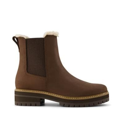 Oak brown Chelsea boots with faux fur lining, featuring elastic side panels, a pull tab, and a chunky sole for added traction.