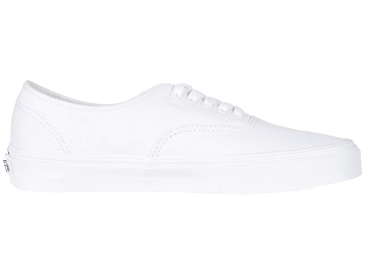 Classic white canvas sneaker with a low-top design, featuring a lace-up front, rubber sole, and Vans logo on the heel.