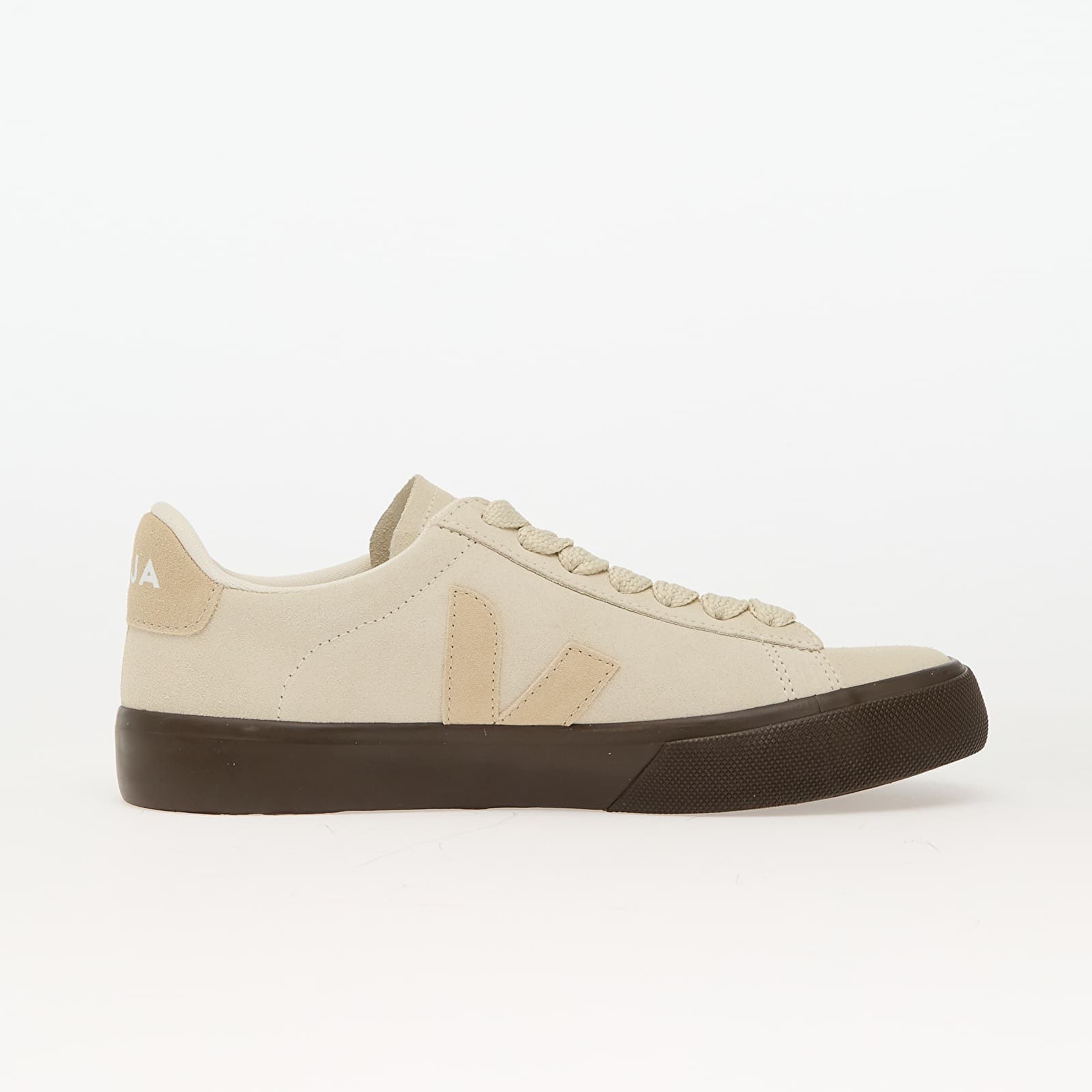 Beige suede sneaker with a dark brown rubber sole, featuring a prominent beige "V" logo on the side and matching laces.