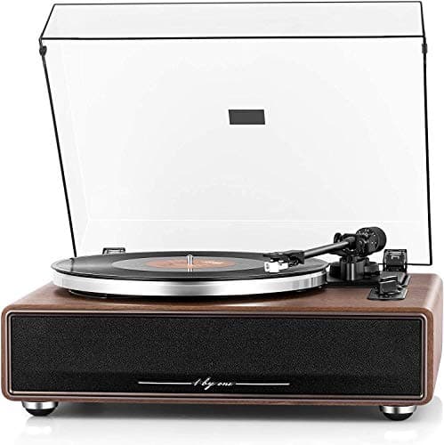High-fidelity belt drive turntable in a wooden finish with built-in speakers, transparent dust cover, and magnetic cartridge, featuring wireless playback and aux-in functionality.