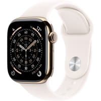Apple Watch Series 11 with gold titanium case, 46mm, featuring a round black dial and light-colored sport band.