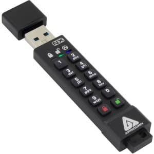 Black Apricorn Aegis Secure Key 3NX flash drive with 32GB capacity, featuring a numeric keypad for security and a protective cap covering the USB connector.