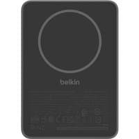Black Belkin wireless charger, 5000 mAh, rectangular with rounded edges, circular charging pad on top.