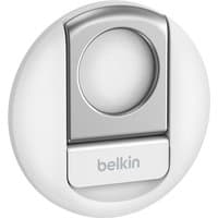White Belkin smartphone holder with circular base and metallic accent, featuring a central grip area for device stability.