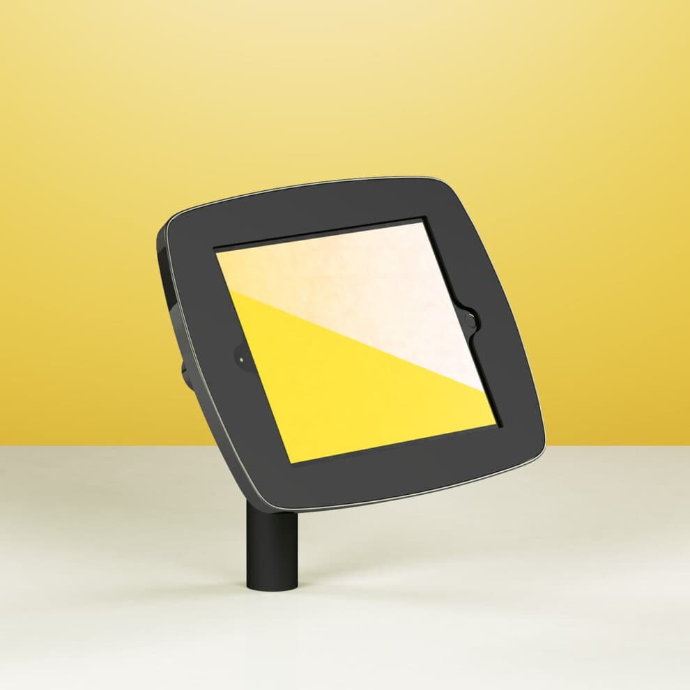 Black Bouncepad Static 60 stand for Samsung Galaxy Tab A 10.1, featuring a sleek design with a tilted screen holder, set against a yellow background.